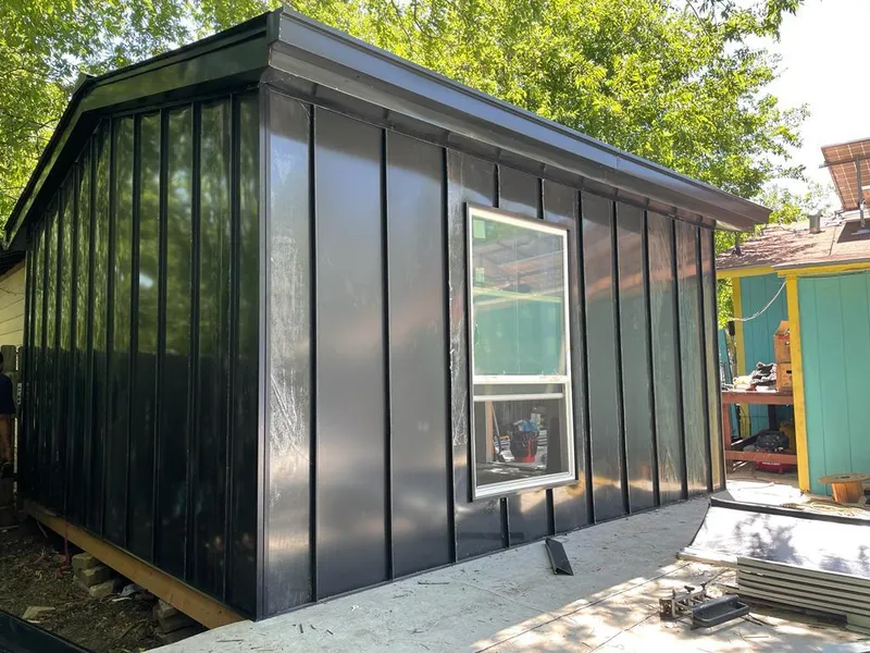 Black standing seam metal wall panels for Metal Roof Installation in Oceola