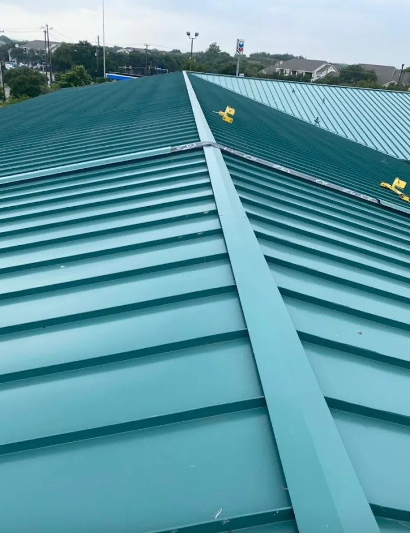 Green commercial metal roof ridge and valley for Metal Roof Repair in Oceola